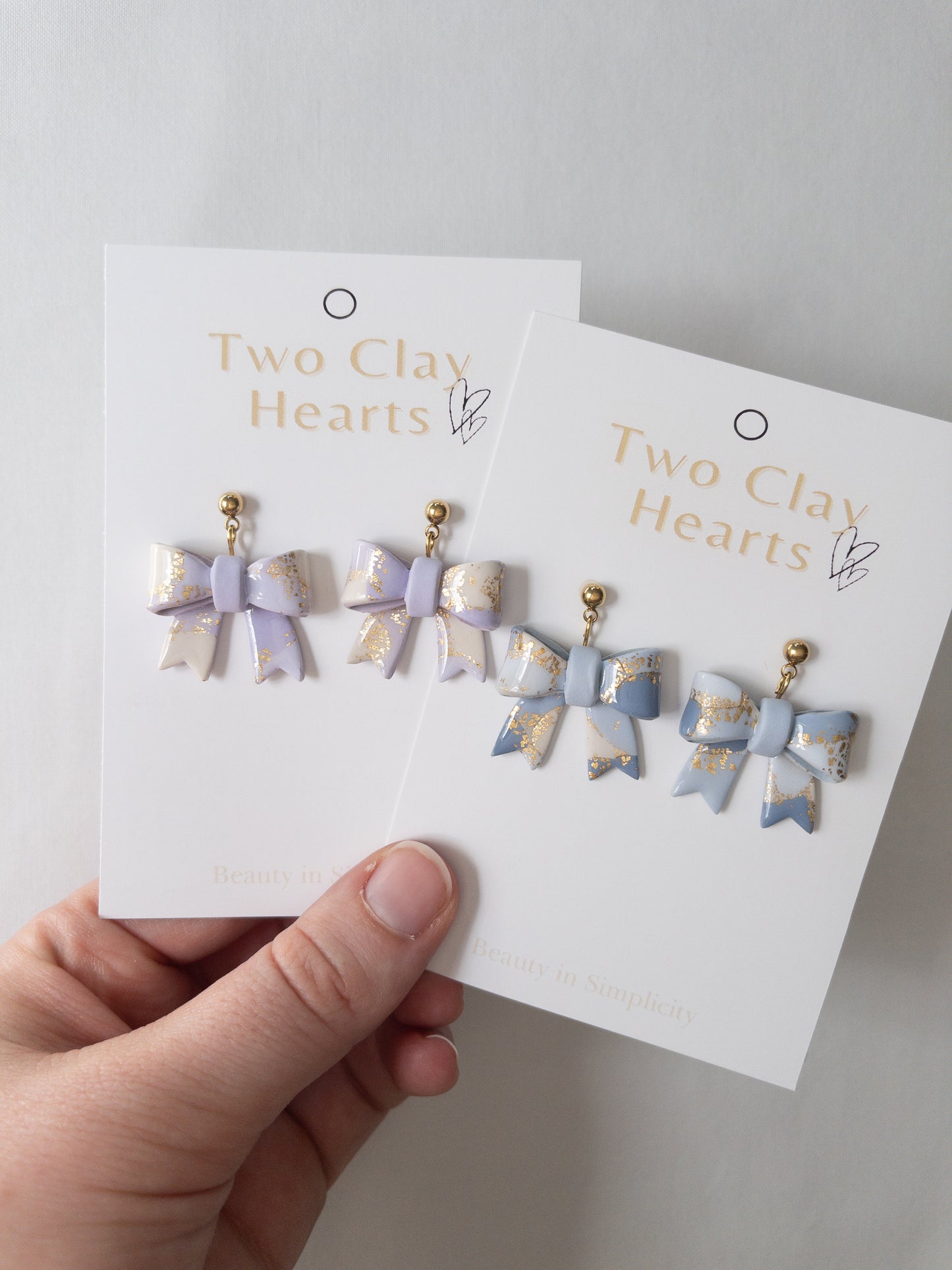 Pastel Blue Gold Leaf Bow Dangles