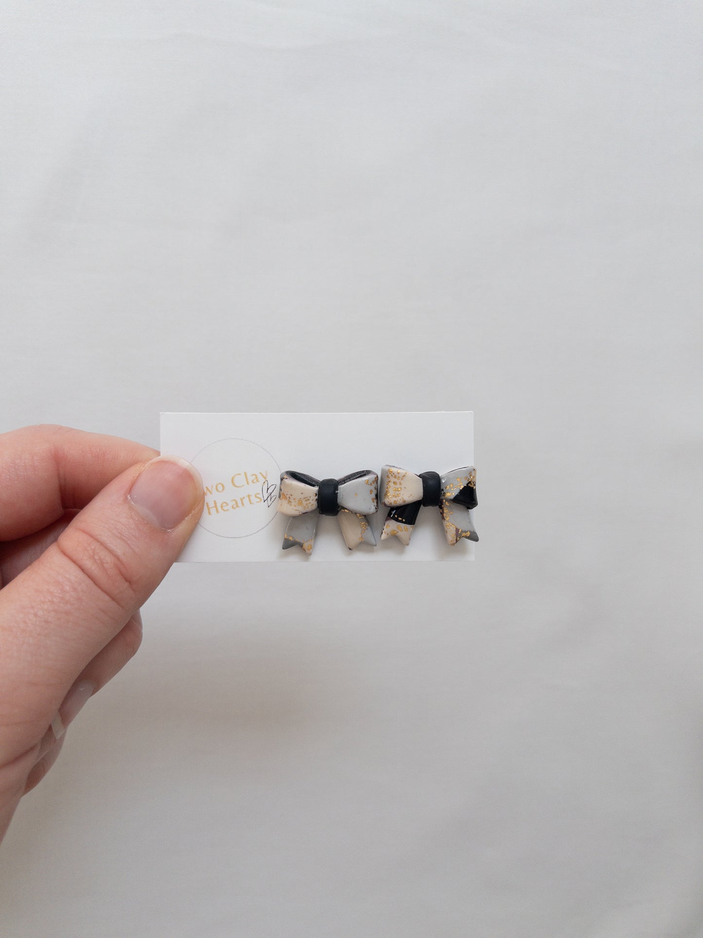 Bright Gold Leaf Bow Studs