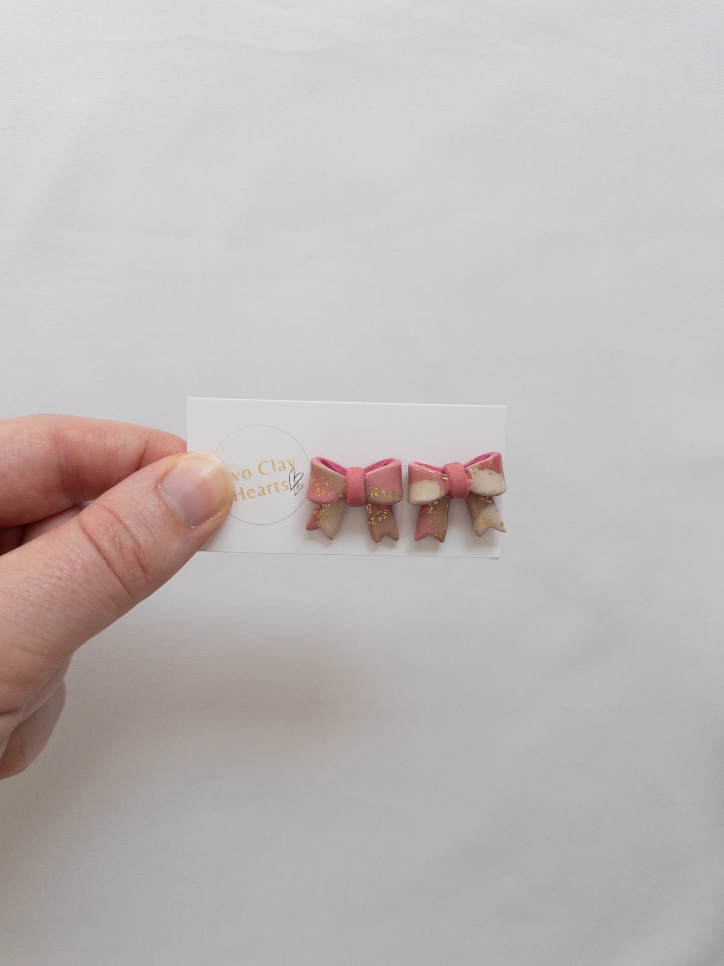 Bright Gold Leaf Bow Studs