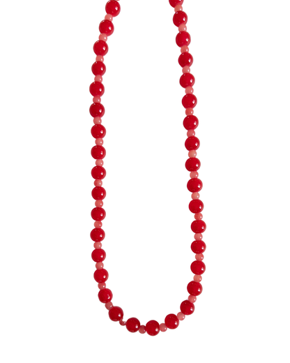 Red beaded necklace on white background
