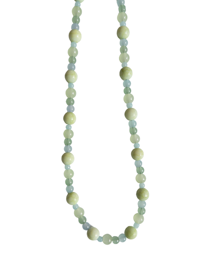 Green coloured glass bead necklace on white background
