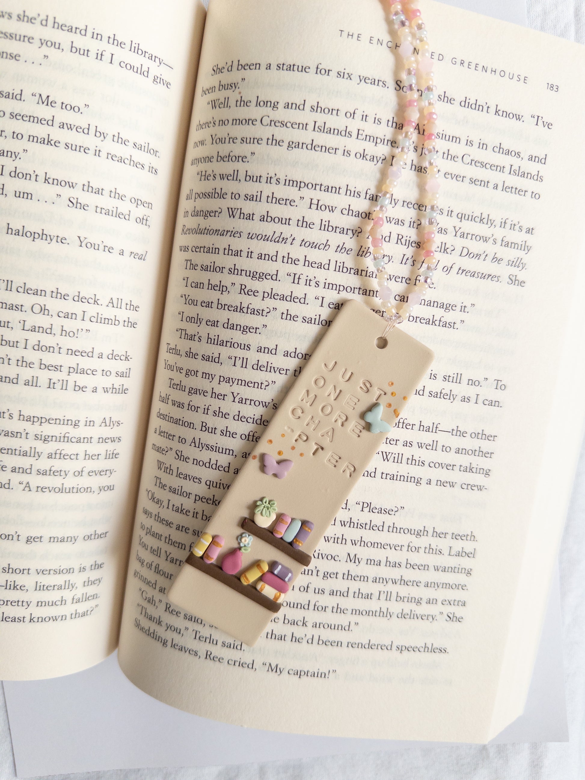 Polymer Clay Bookmark on top of open book page