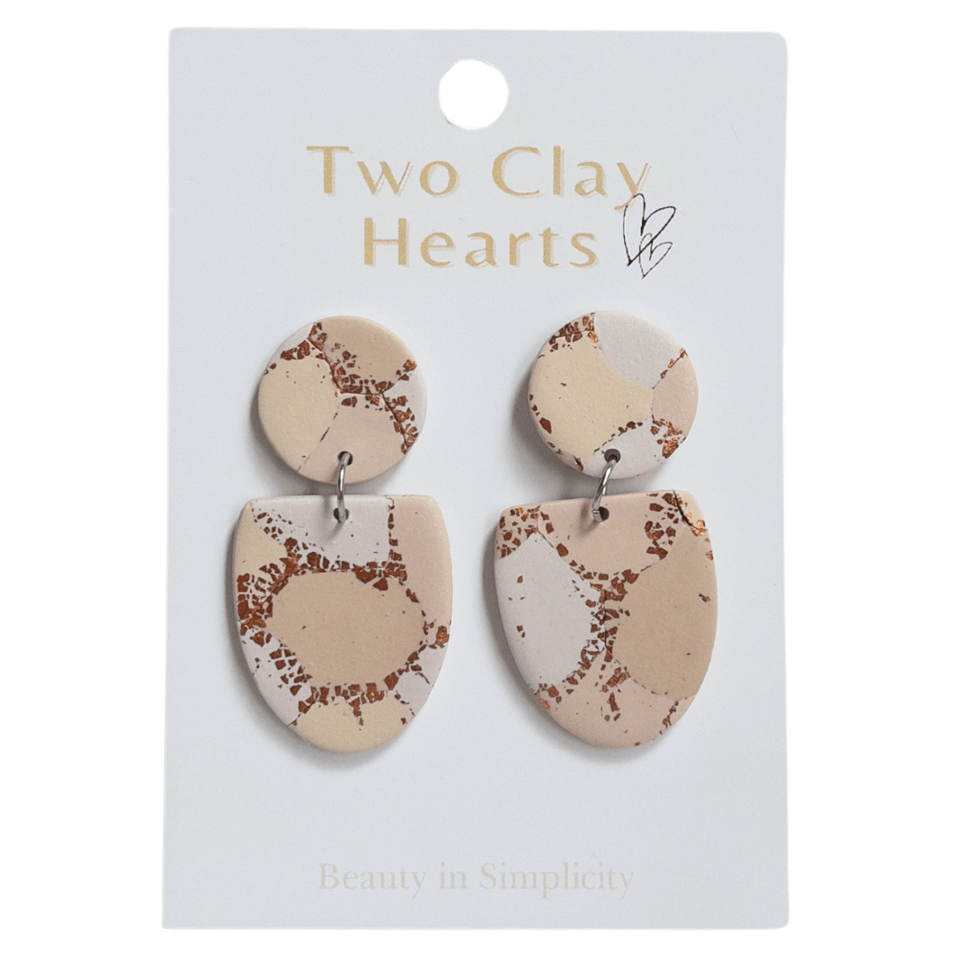 Tan and copper patterned half oval dangle earrings