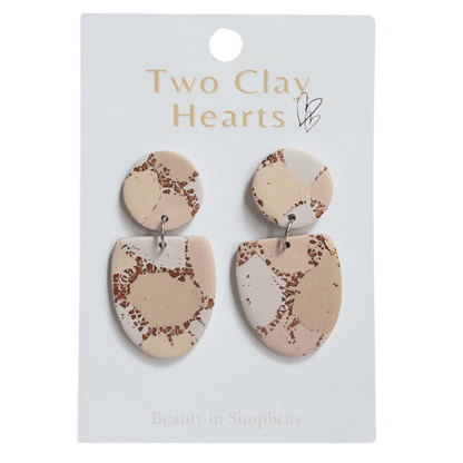 Tan and copper patterned half oval dangle earrings