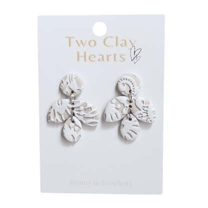 white lace earrings in a unique firefly shape