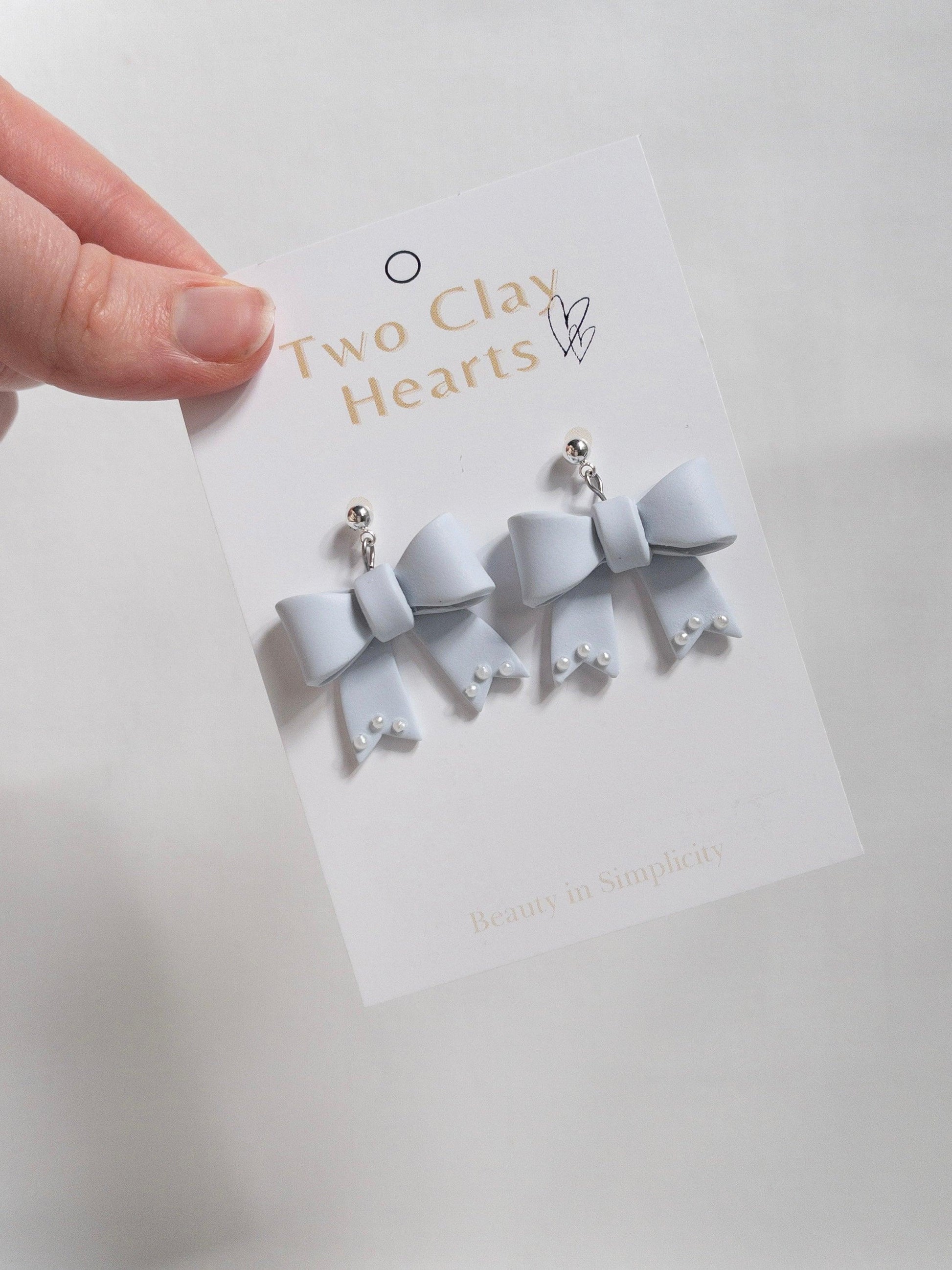 Large Blue Clay Bow Dangle Earring with Pearl Details - Two Clay Hearts