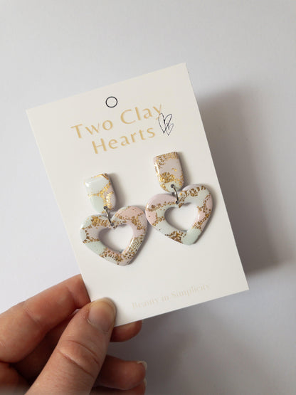 Pastel love heart shaped earrings with gold flecks