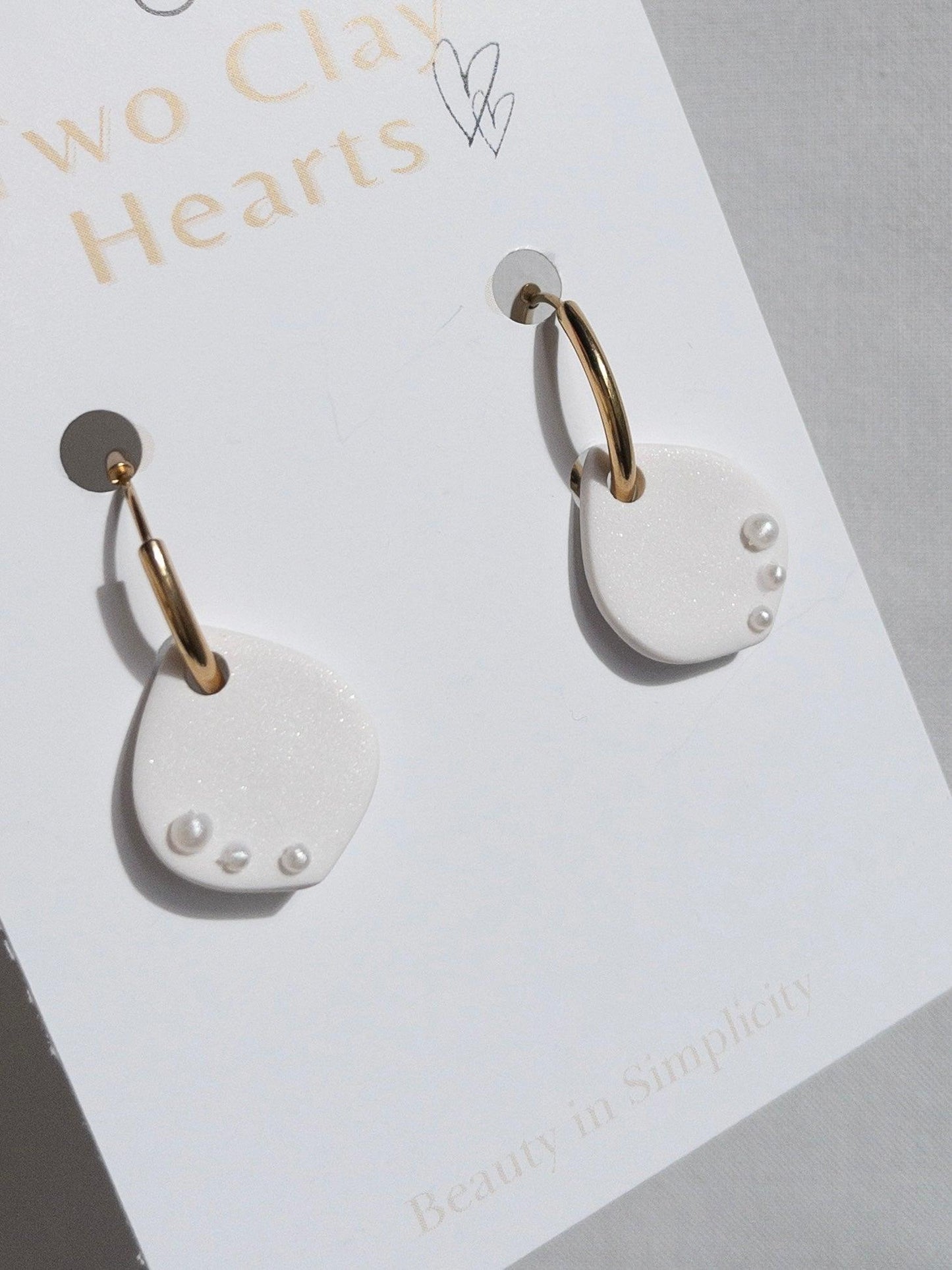 Pearly White Clay Teardrop Hoops - Two Clay Hearts