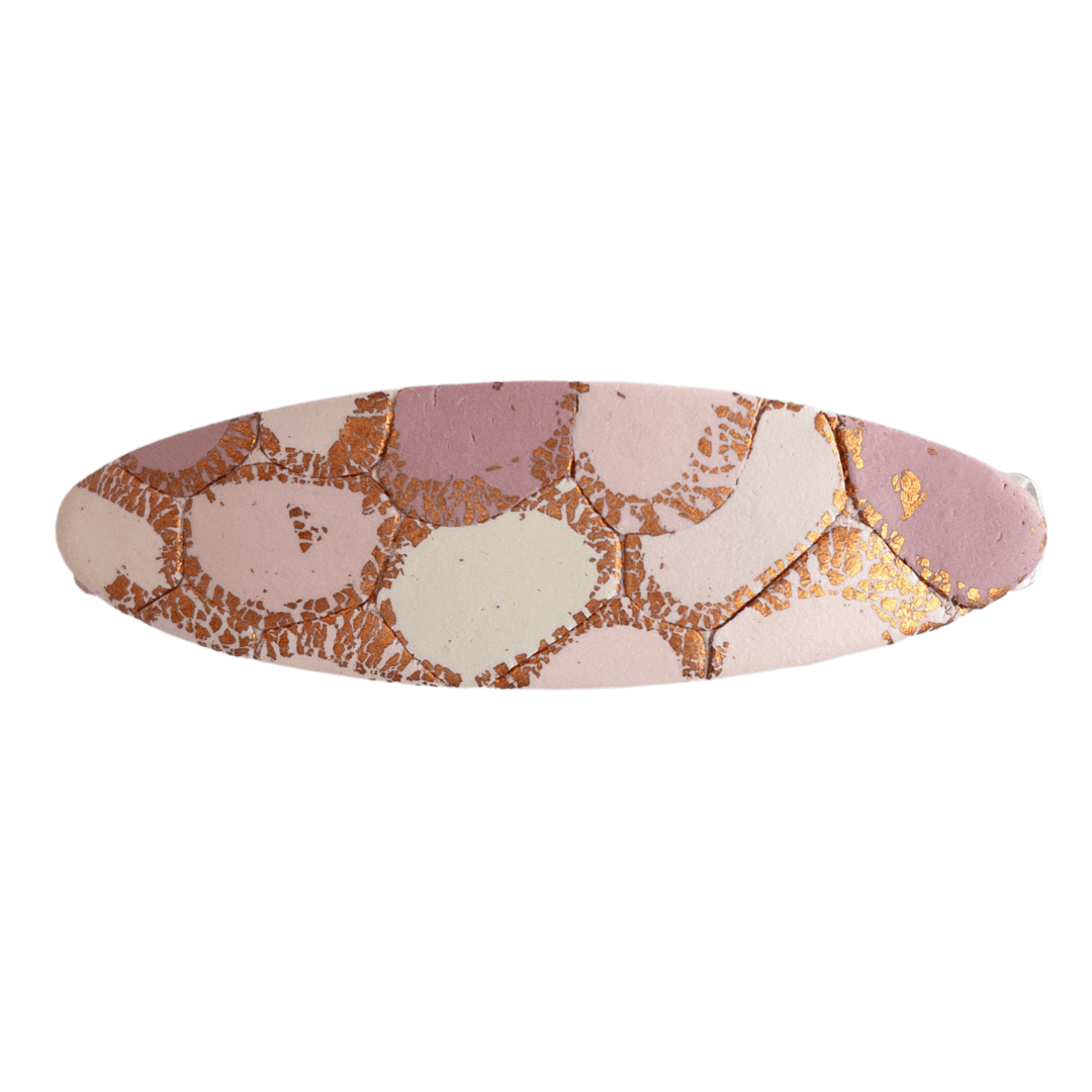 Pink and Rose Gold patterned oval hair clip made out of polymer clay