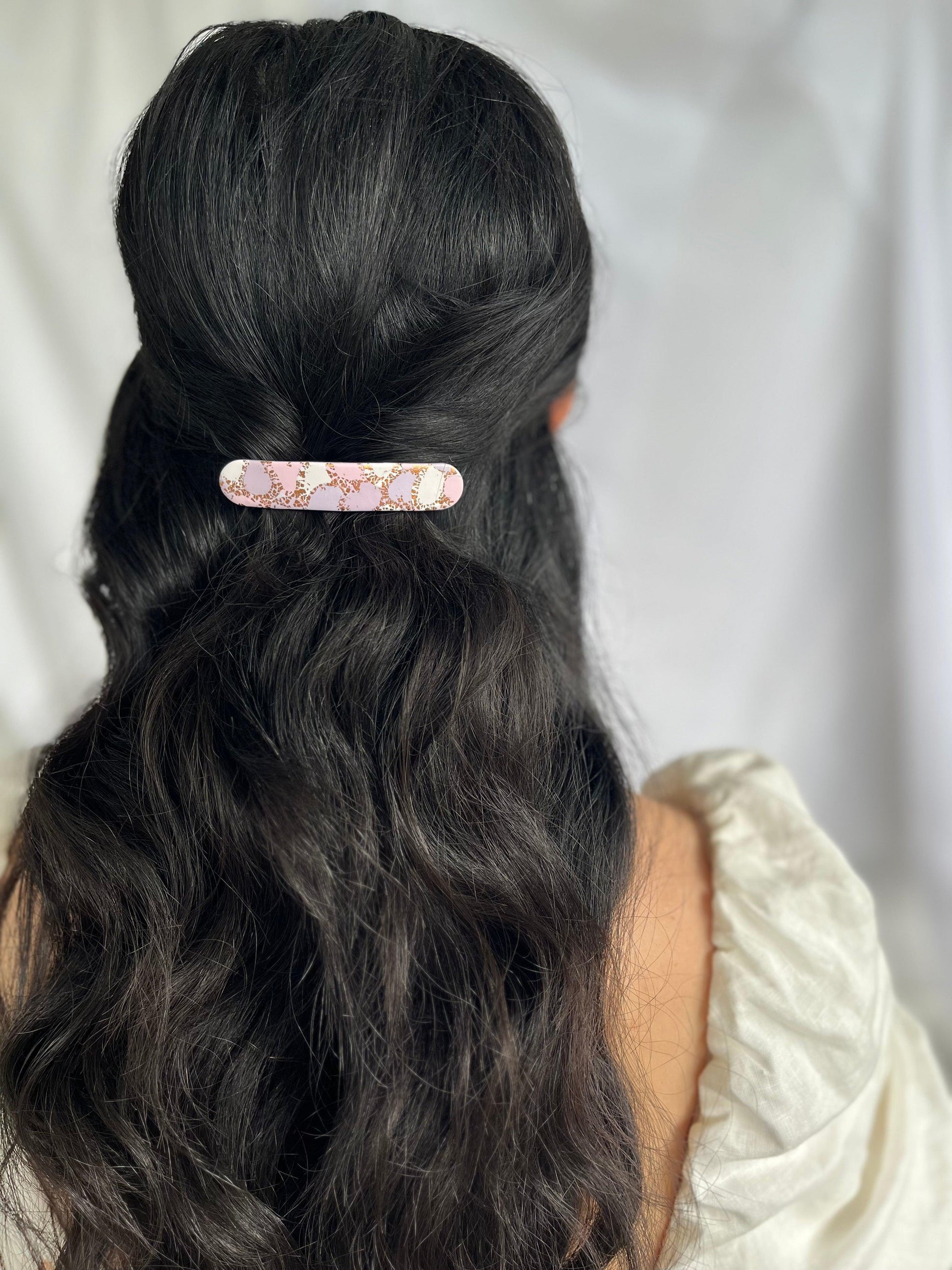 Example of long polymer clay hair clip in models hair