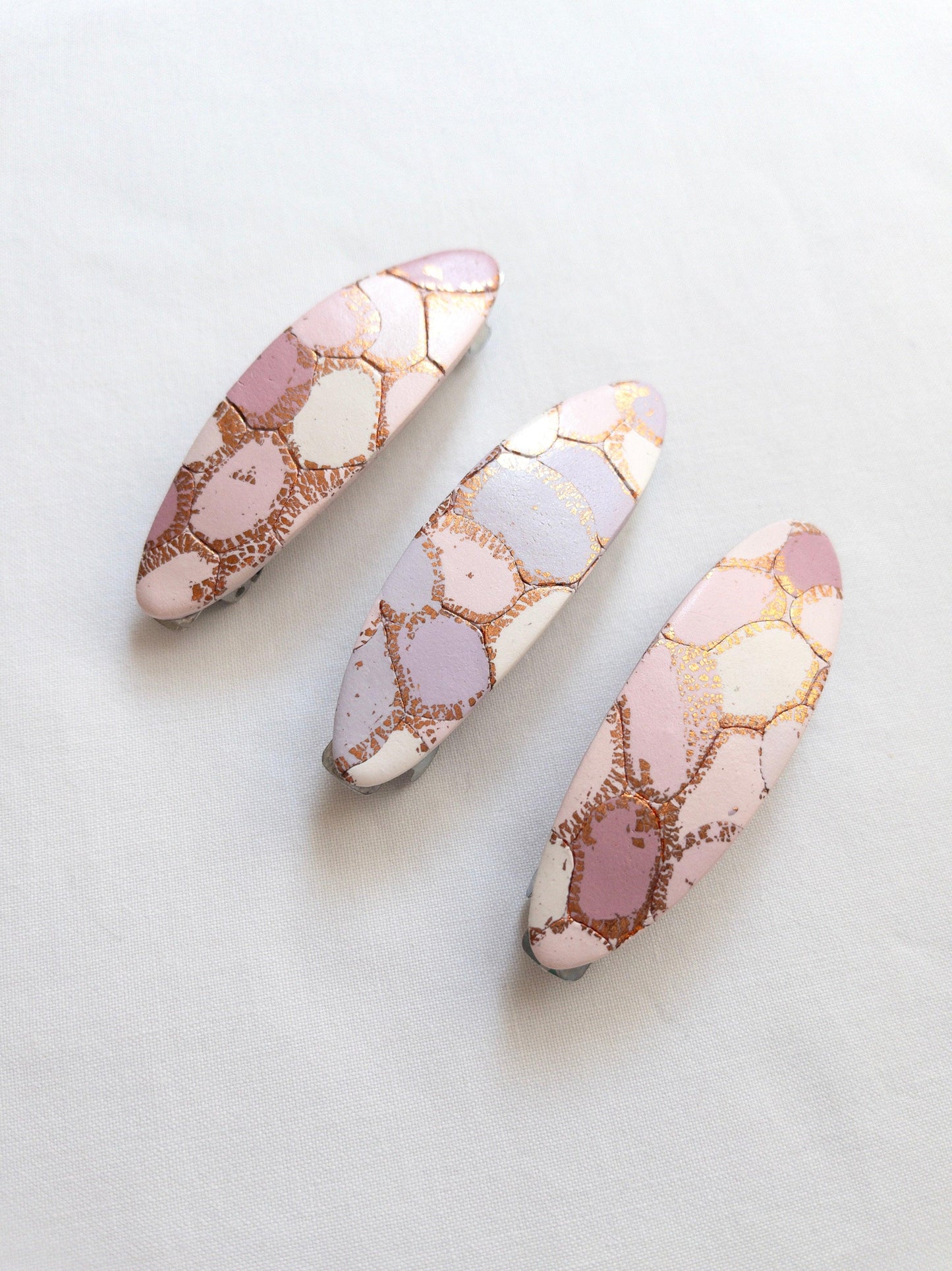 Polymer Clay oval hair clips with pastel and gold patterns