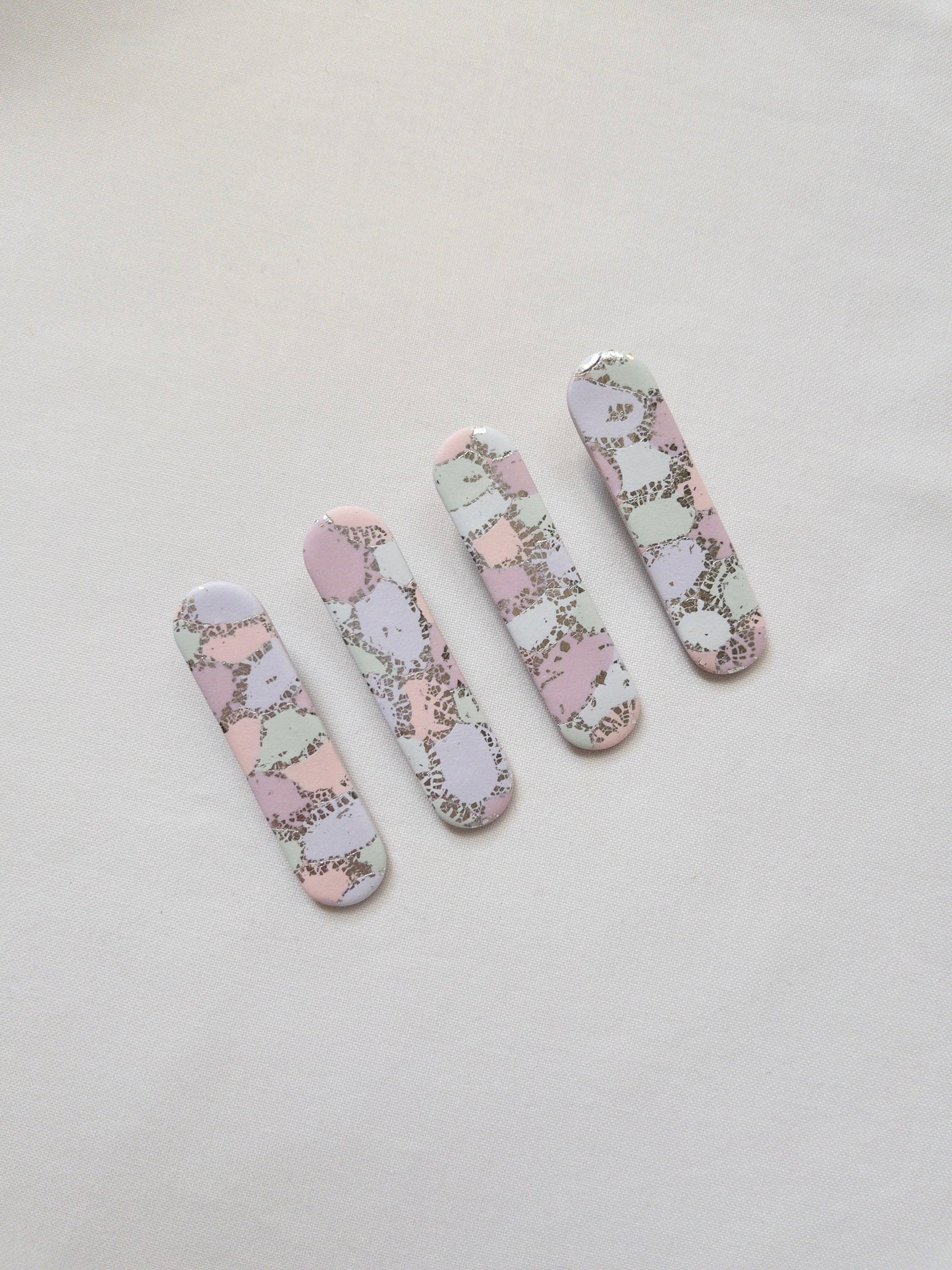 pastel rainbow coloured hair clips with silver flecks