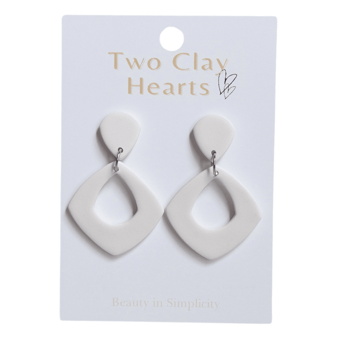 White, wide diamond shaped, dangle earring