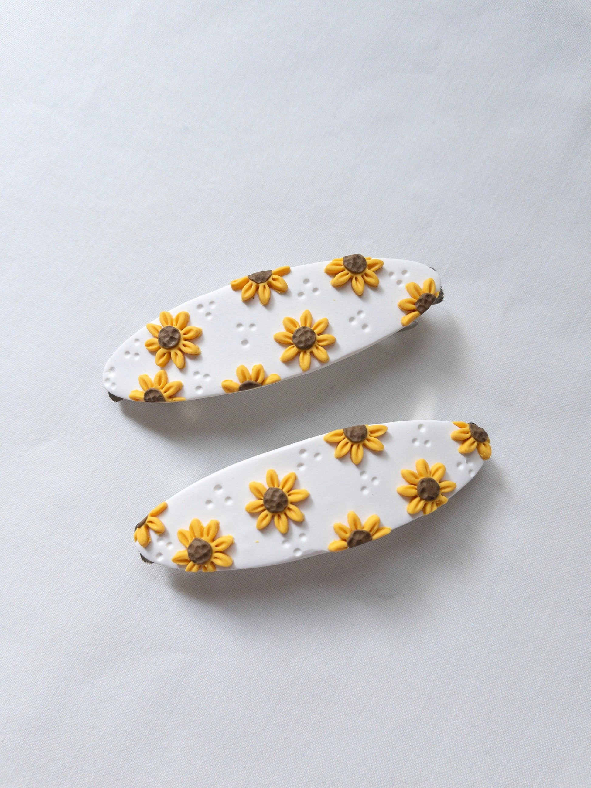 Large oval sunflower hair barrettes