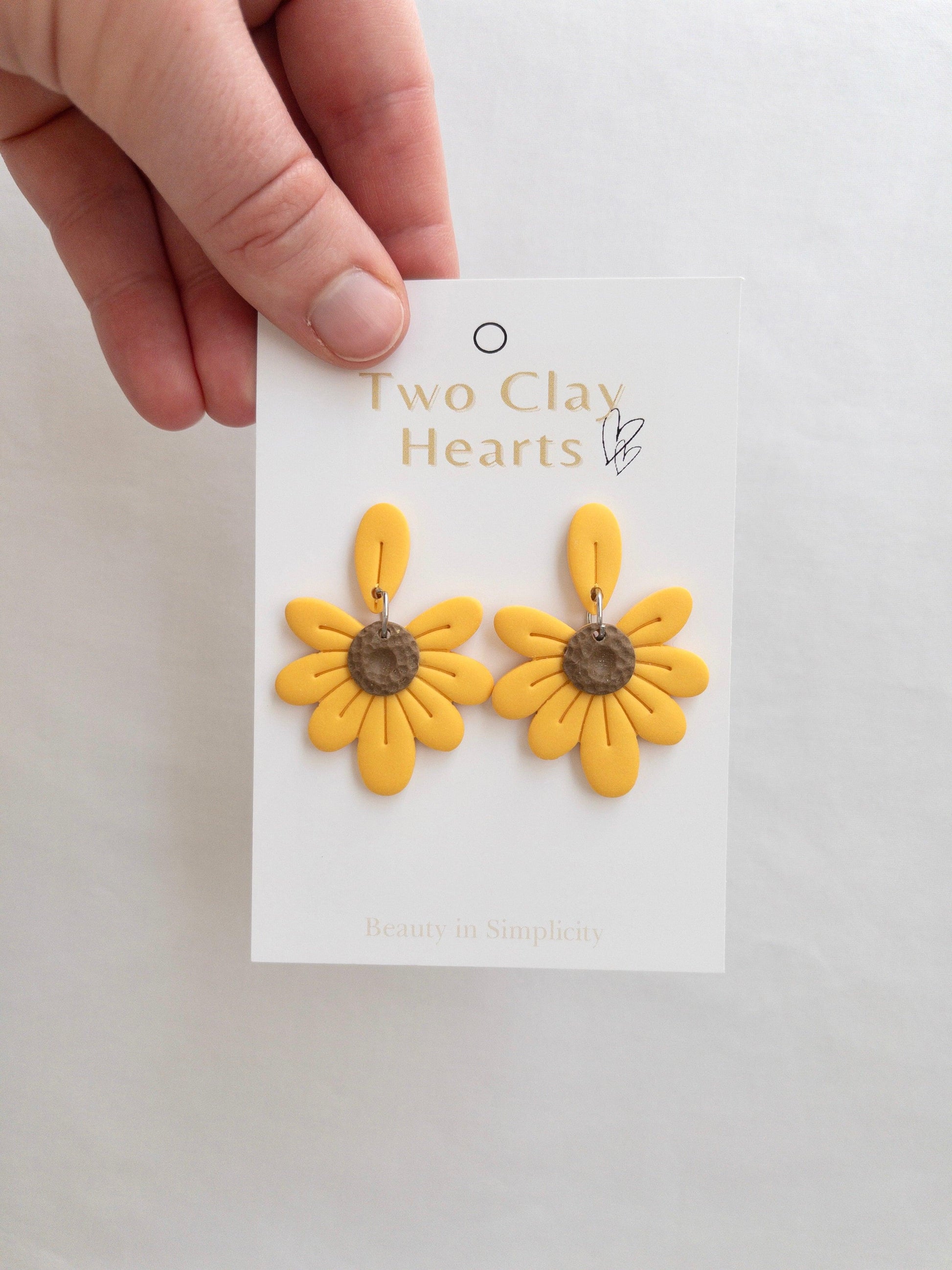 Sunflower petal shaped, yellow dangle earrings